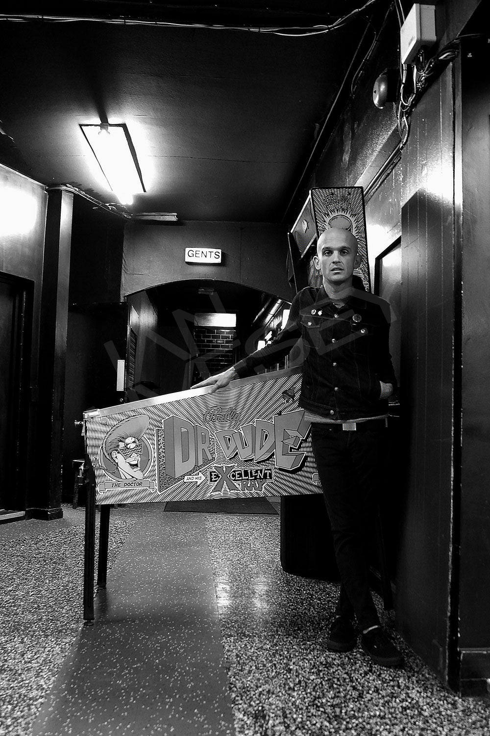 Zach Blair in front of the Dr Dude Pinball machine - Limited Print Run
